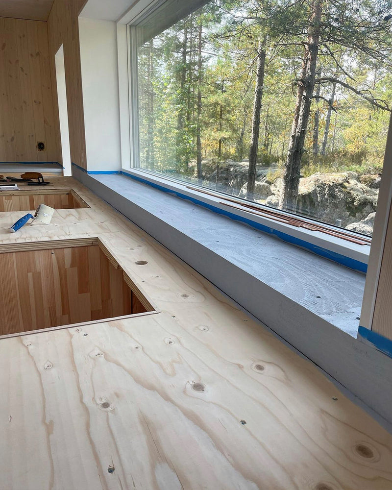 Kök renoverat med mörkgrå microcement – bänkskiva - före